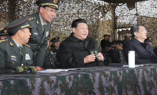 Chinese President Xi Jinping, center, watches drills of troops of the Chinese People's Liberation Army in northwest China's Xinjiang Uighur Autonomous Region. (Photo: AP Photo/Xinhua News Agency) Chinese President Xi Jinping, center, watches drills of troops of the Chinese People's Liberation Army in northwest China's Xinjiang Uighur Autonomous Region. (Photo: AP Photo/Xinhua News Agency)